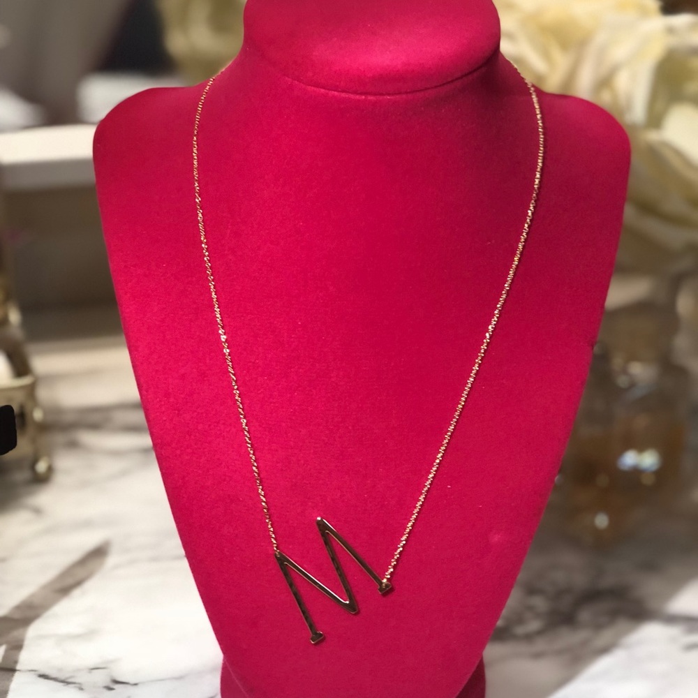 The initial necklace